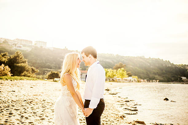 istock Just merried couple at the beach 503873656