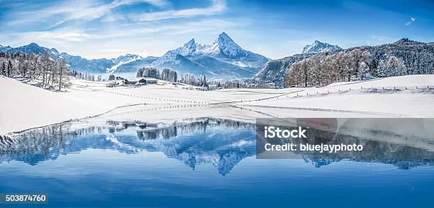 Winter Wonderland In The Alps Reflecting In Crystalclear Mountain Lake Stock Photo - Download Image Now