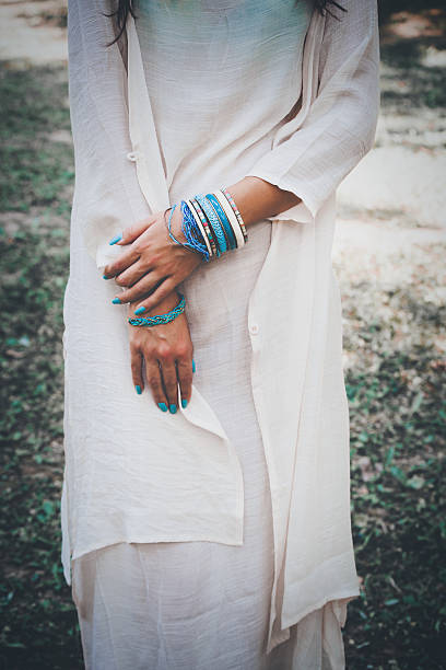 istock woman hands with bracelets 503884264