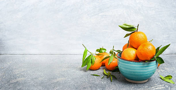 Tangerines with leaves , banner