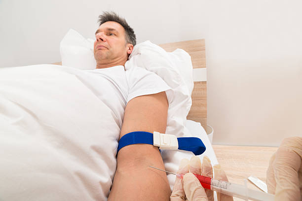 istock Doctor Taking Blood Samples Of Patient 503886434