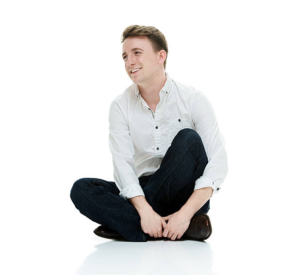 istock Casual man sitting on floor 503886952
