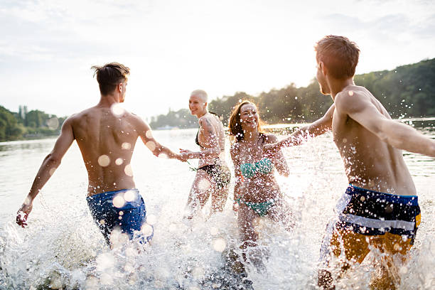 istock Young Couples Running In Lake 503888183