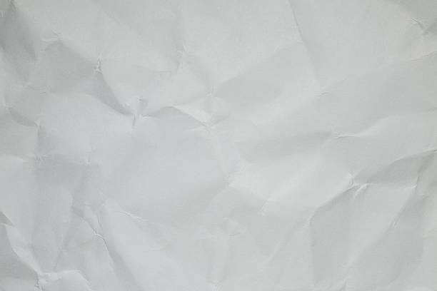 istock White creased paper background texture 503889941
