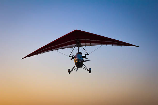 istock The motorized hang glider in the sky 503889986