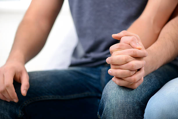 istock Loving homosexuals sitting on the sofa 503890824
