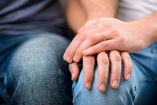 istock Loving homosexuals sitting on the sofa 503890856