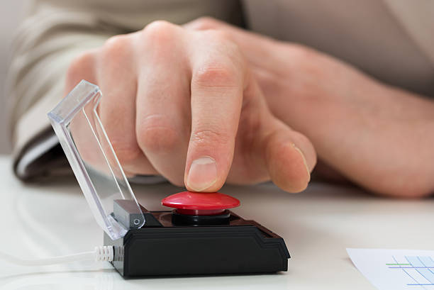 istock Businessperson Hand Pressing Emergency Button 503894736