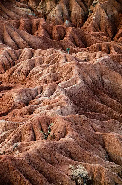 Big red sandstone rock formation in hot dry desert of Tatacoa, Huila, Colombia