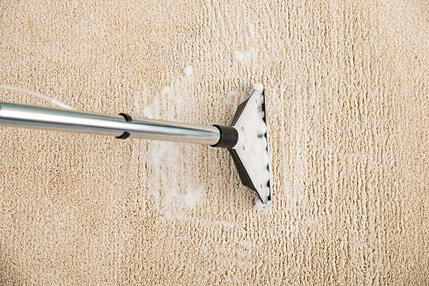 istock Vacuum Cleaner Over Carpet With Foam 503896646
