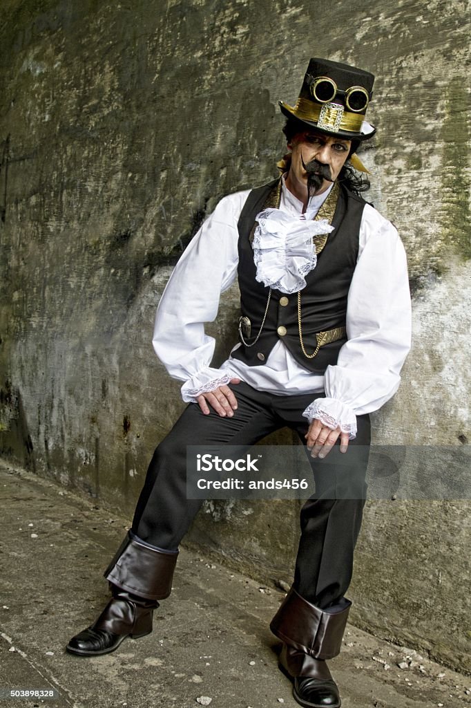 Man Dressed In Steampunk Victorian Clothing Dark Wall Background Stock ...