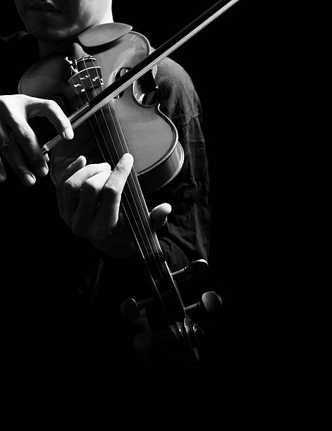 istock male violinist hands playing classical violin 503899242