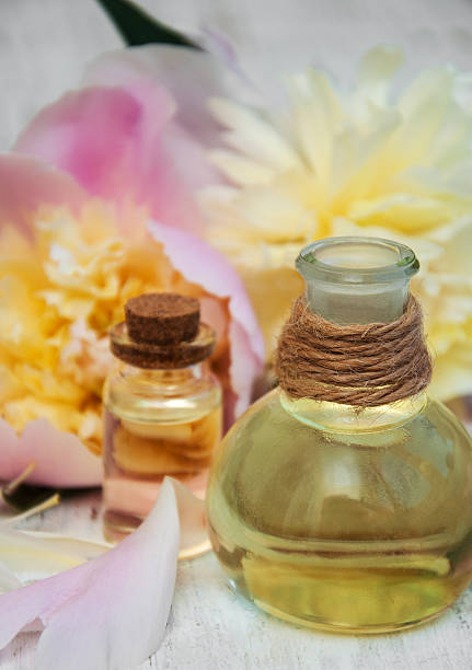 istock Peony flowers and  massage oils 503899476