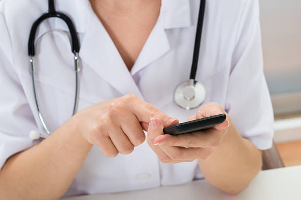 istock Doctor With Stethoscope And Mobile Phone 503899618