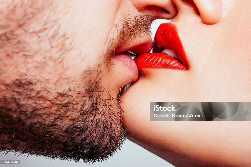 Couple kiss Close up of a men and woman lips wants to kiss. Kissing Stock Photo