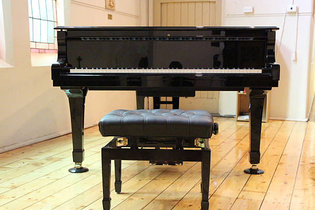 istock Frontal-view of a church piano 503915073