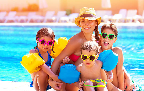 istock Happy family at the pool 503915245