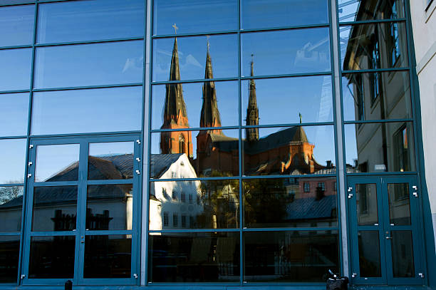 отражение - uppsala cathedral стоковые фото и изображения