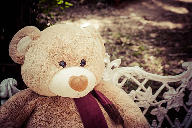 istock Lonely Teddy bear looking for someone , vintage style 503916004