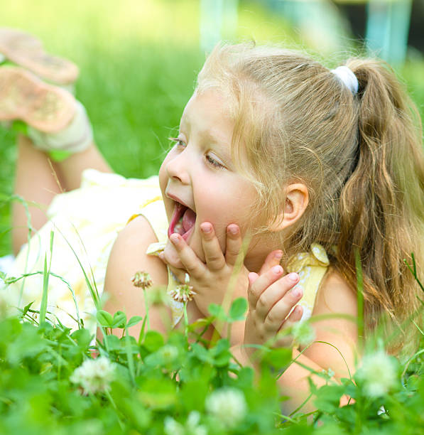 istock Young girl is playing outdoors 503916257