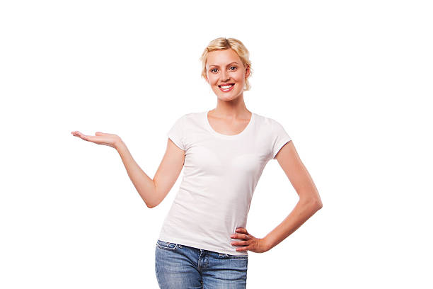 istock Happy smiling beautiful young woman showing copyspace or something, isolated 503916337