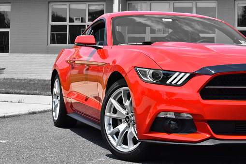New Jersey, United States - July 11, 2015: The newly re-designed and released 2015 mustang eco-boost.  Proudly showing off the Race Red paint.