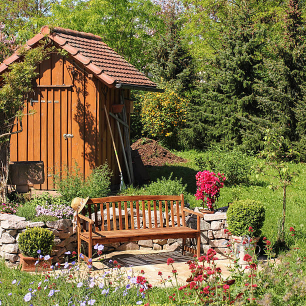 Seat place, herb garden, rockery and tool shed in the garden.