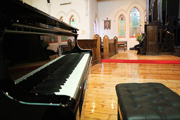 Beautiful black piano in a bright and open church