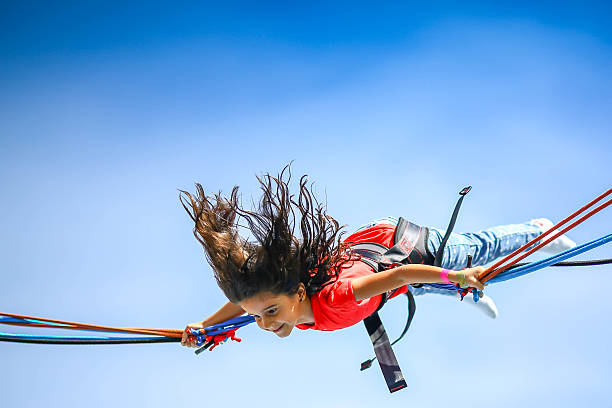 istock Young girl in the air 503918272