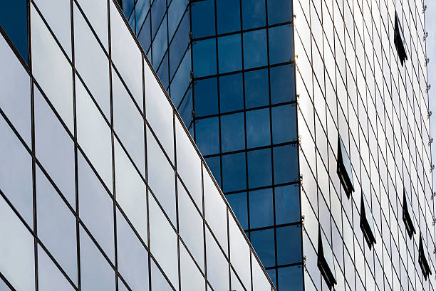 istock Perspective angle view to modern glass building skyscrapers 503918439