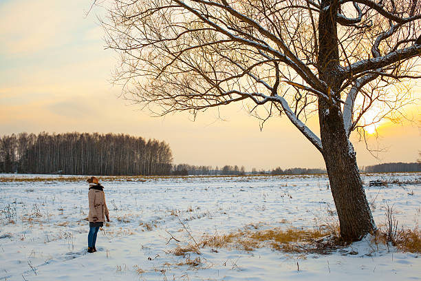 istock People standing in a winter forest 503919038