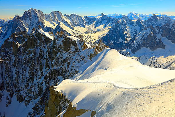 Mountaineers trekkers and Mont Blanc Massif, French Alps, Chamonix You can see my CHAMONIX & MONT BLANC MASSIF photo collection (Chamonix, Mont Blanc Peak, Mont Blanc Massif, Cities, mountains, meadows, sunsets, sunrises, and much more!!!! ) here!! leisure activity french culture sport high angle view stock pictures, royalty-free photos & images