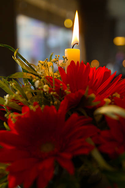 istock Bouquet of gerberas with a candle 503919911