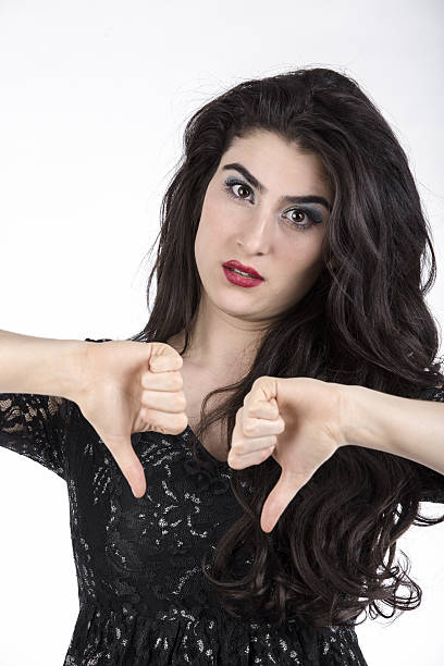 istock Beautiful young woman posing over white background 503920790