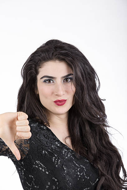 istock Beautiful young woman posing over white background 503920814