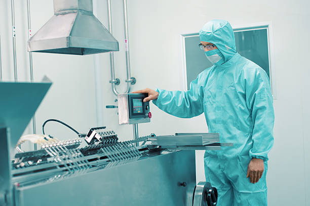 pharmaceutical factory worker pharmaceutical factory worker pharmaceutical factory stock pictures, royalty-free photos & images