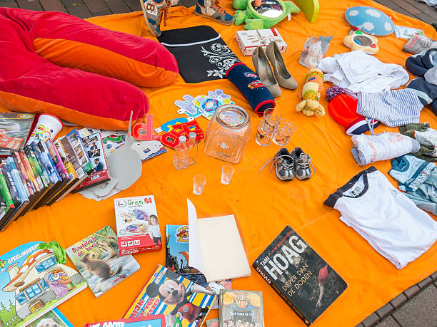 Hilversum, Netherlands - April 27, 2015: Display of used goods on flea market on King's Day in the Netherlands