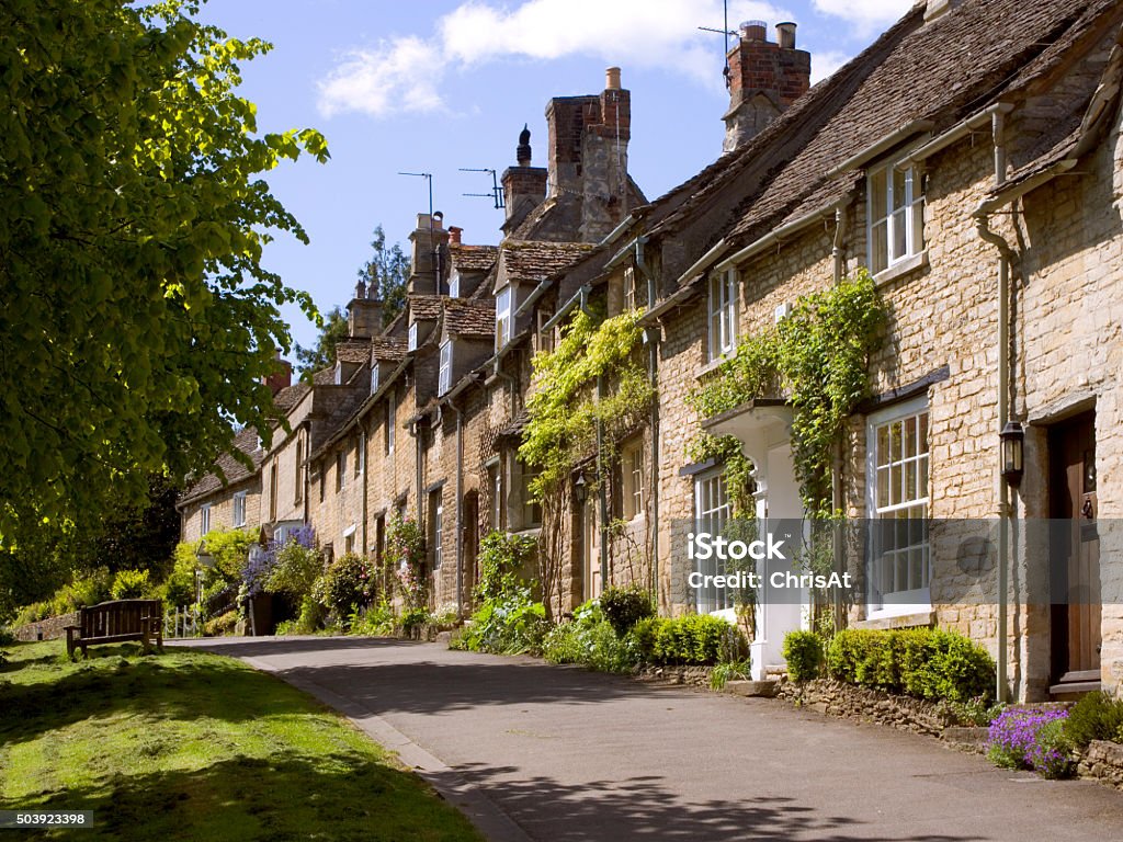 Picturesque Cotswolds,  Burford Picturesque Cotswolds street scene in Burford, Oxfordshireshire, UK House Stock Photo