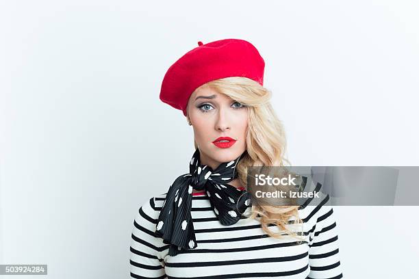Worried Blonde French Woman Wearing Red Beret Stock Photo - Download Image Now - Adult, Adults Only, Arts Culture and Entertainment