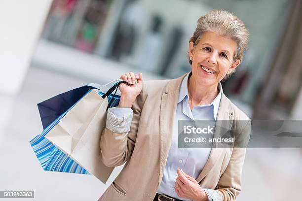 Happy Woman Shopping Stock Photo - Download Image Now - One Woman Only, Retail, Sale