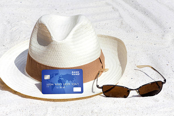 istock Credit card lying on the beach 503944237