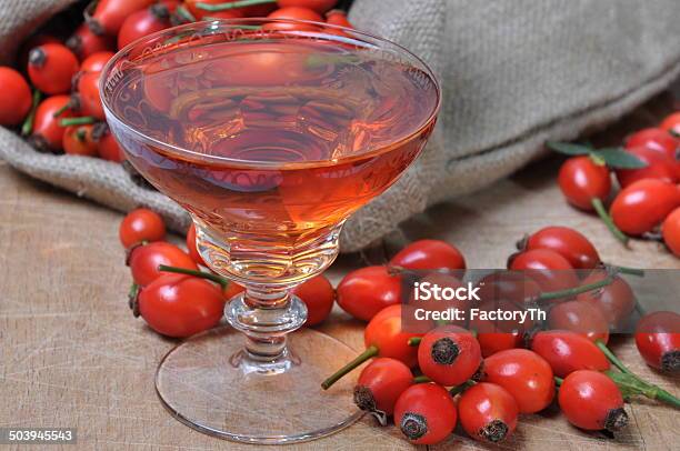 Rosehip Fruit And Alcoholic Liquor Stock Photo - Download Image Now - Rose Hip, Wine, Preserves