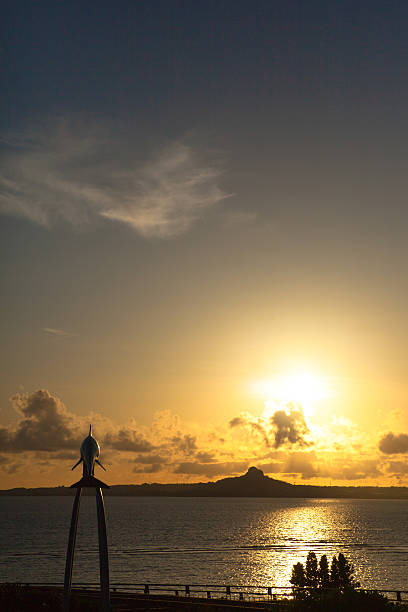 istock Sunset over the island and dolphin monument 503945715