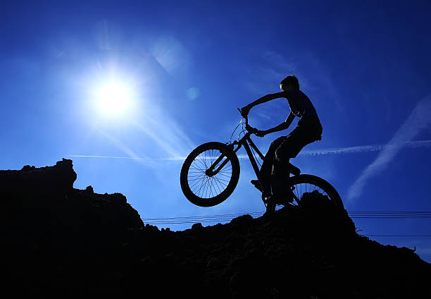 istock Cyclist silhouette on BMX bike 503946543
