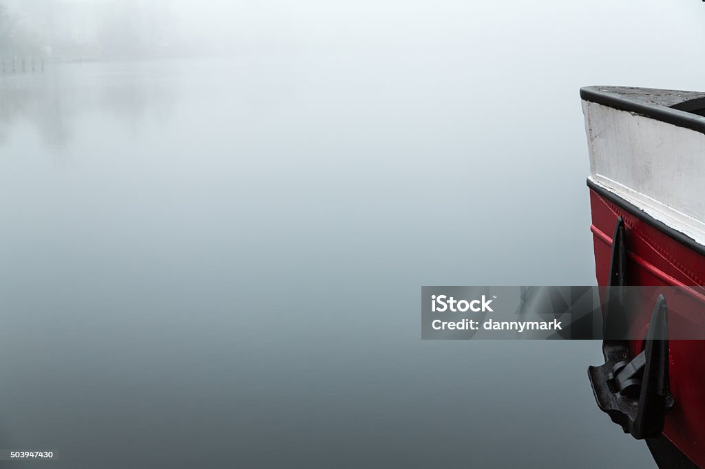 River Havel Old vessel on the river Havel during calm and foggy weather. Anchor - Vessel Part Stock Photo