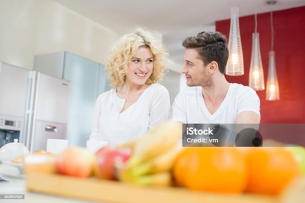 Couple Having Breakfast Young couple having healthy breakfast at home. 25-29 Years Stock Photo