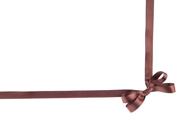 istock Brown ribbon with a bow on  white background 503947785