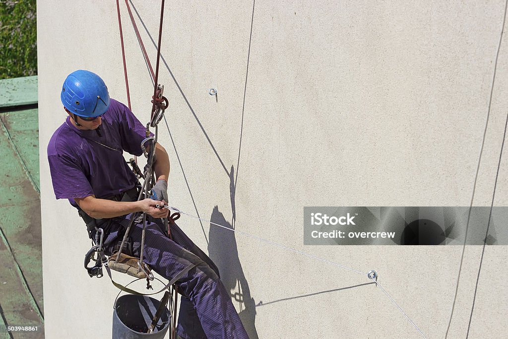 Work at height Specially equipped worker performs height work,photography Rope Access Technician Stock Photo