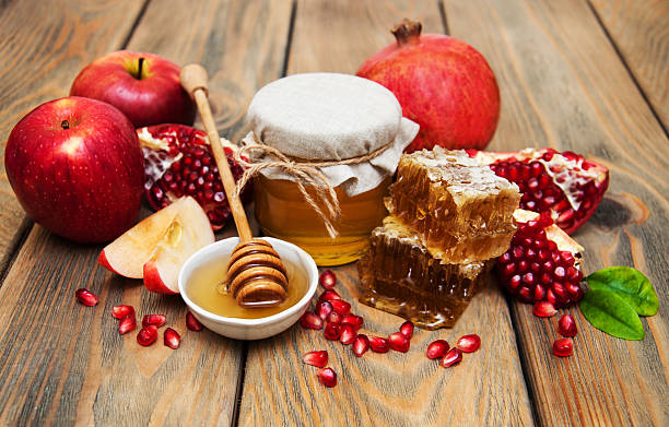 istock Honey with pomegranate and apples 503949282