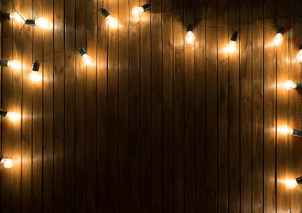 istock Light bulbs on dark Wooden Background 503950102